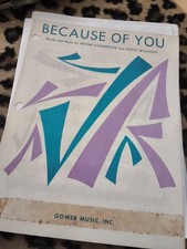 The sheet music in your image is for the popular song "Because of You," composed