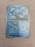 Frigibax 017/091 Reverse Holo Near Mint Pokémon TCG Paldean Fates