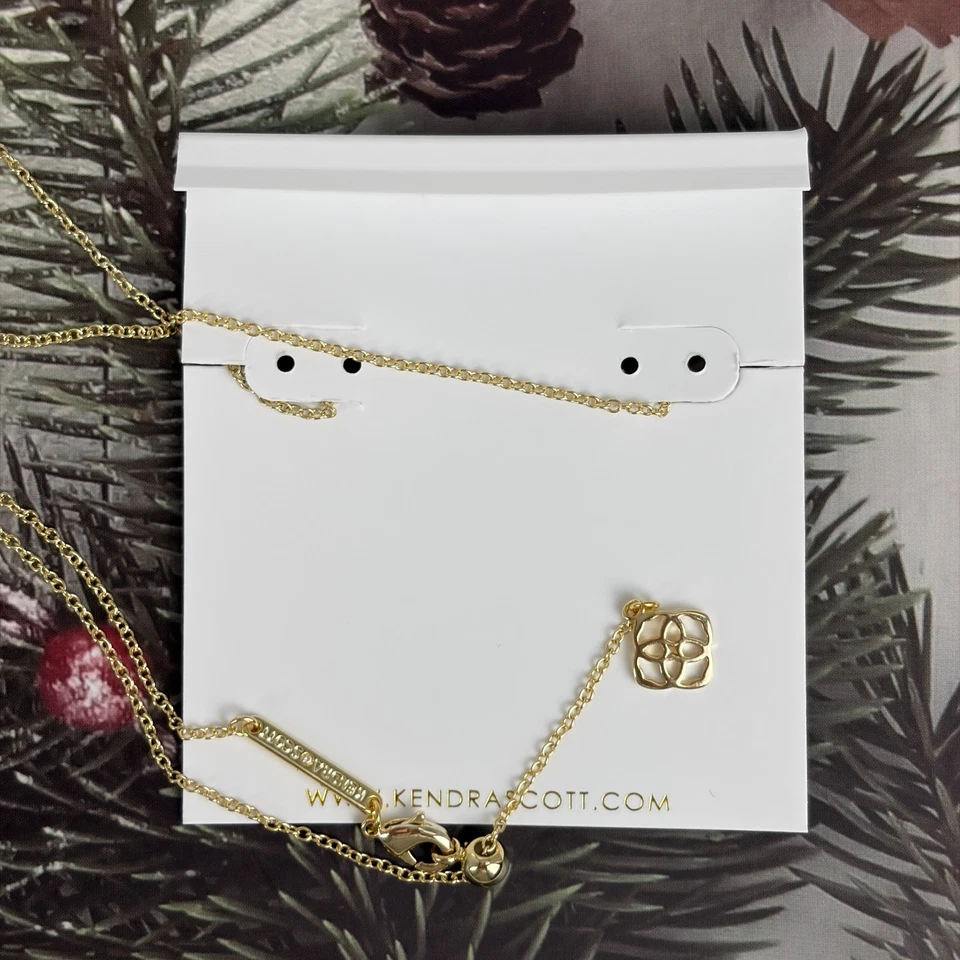 Collar colgante corto dorado bastón de caramelo Kendra Scott en marfil nácar Foto 2 de 4