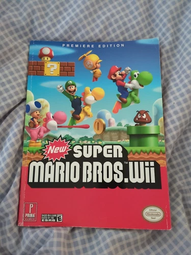 New Super Mario Bros. Wii, Premiere Edition, Walk Though Guide Book with poster.