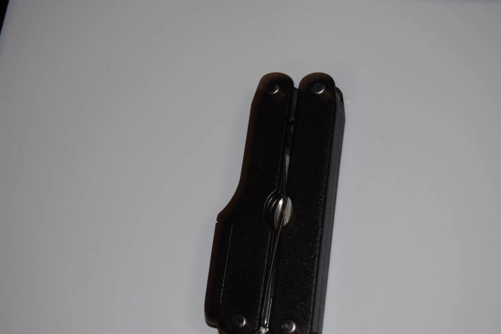 MULTI TOOL/(RED DOT) (7 TOOLS IN ONE)..