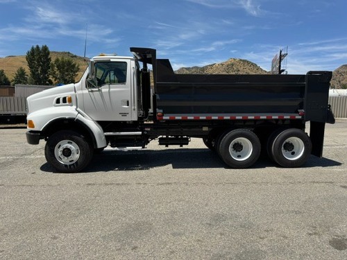 STERLING LT-9500 HEAVY DUTY DUNP TRUCK LOW MILES, 400 HP, SHOW ROOM CONDITION