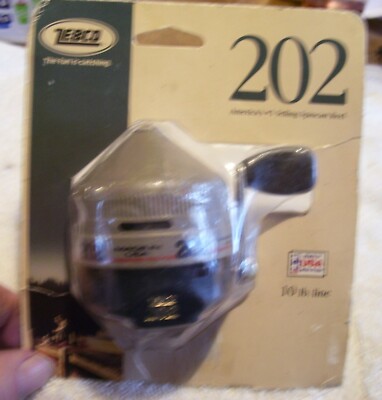 VINTAGE ZEBCO 202 REEL 4/10/22  SEE TAG USA  NEW IN PACKAGE