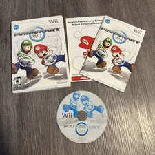 Mario Kart Wii Complete in Box with Manual. Tested Working