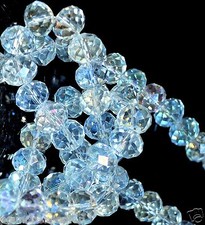 A string of 100 pcs quality clear AB faceted glass crystal beads of 6 x 4 mm