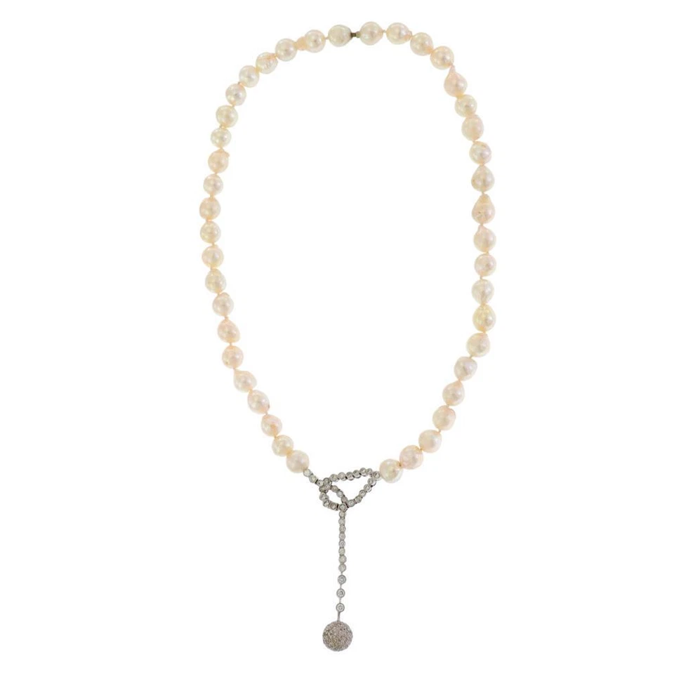 Collar colgante vintage de perlas barrocas de diamantes de 1,70 quilates con nudo de bola de oro de 18 quilates Foto 2 de 4