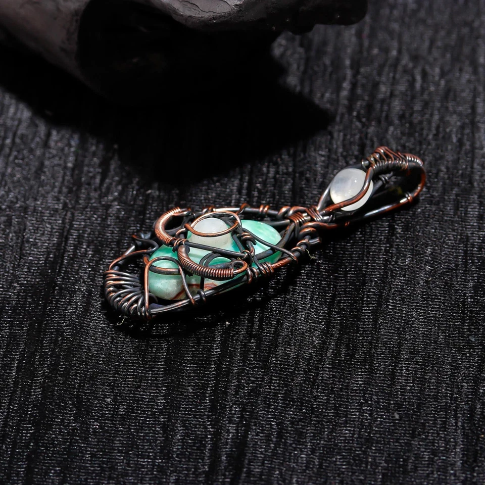 Colgante de joyería de cobre envuelto en alambre diseño hecho a mano piedras preciosas de piedra lunar Larimar Foto 4 de 4