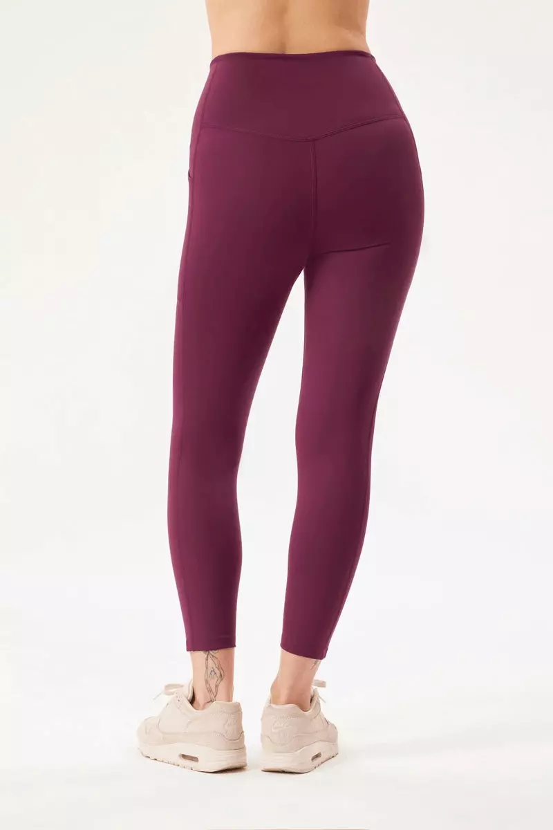 girlfriend-collective plum compressive pocket leggings