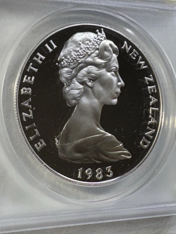 Nueva Zelanda 1983 $1 plata prueba graduada PR 69 DCAM por ANACS 50 años de monedas de Nueva Zelanda Foto 2 de 4
