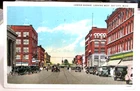 1929 BAY CITY MICHIGAN Mi., Postcard Center Ave Looking West Autos, Stores, cars