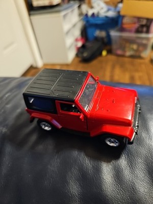 Jada Toys  2016 1:32 Jeep Wrangler Red Die Cast- 4.5 In Long, 2 In Tall