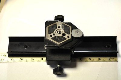 Manfrotto Bogen quick release swivel head on a 11 1/2'' rail as shown. 