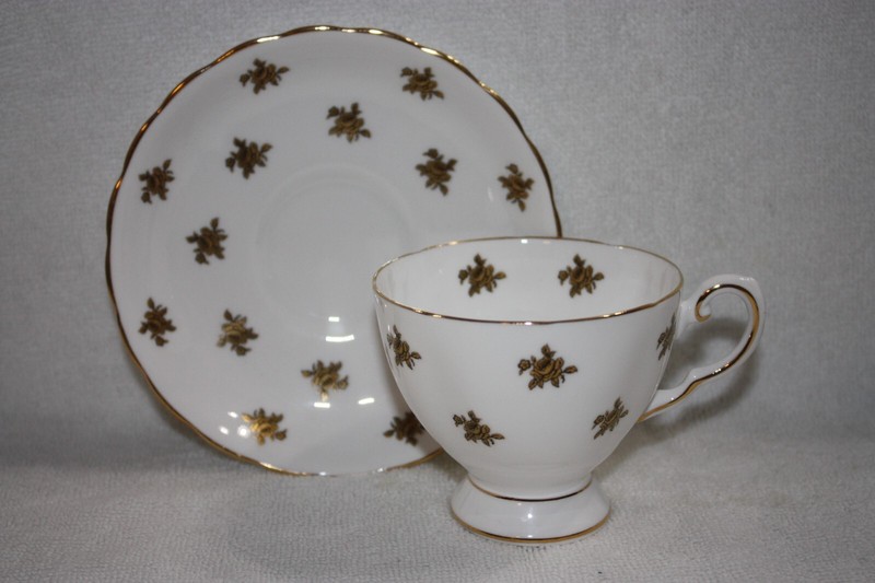 Tuscan Fine Bone China Footed Copper Roses teacup and saucer