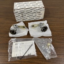 DELTA H215CB TWO CHROME AND P0LISHED BRASS LEVER HANDLE SET