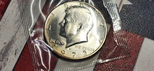 1973 D Uncirculated Kennedy Half Dollar in Mint Cello  "FREE SHIPPING"