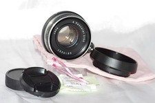 BEL objectif 50mm f2 CARL ZEISS PANCOLAR bouchons, pare-soleil et housse.  RARE