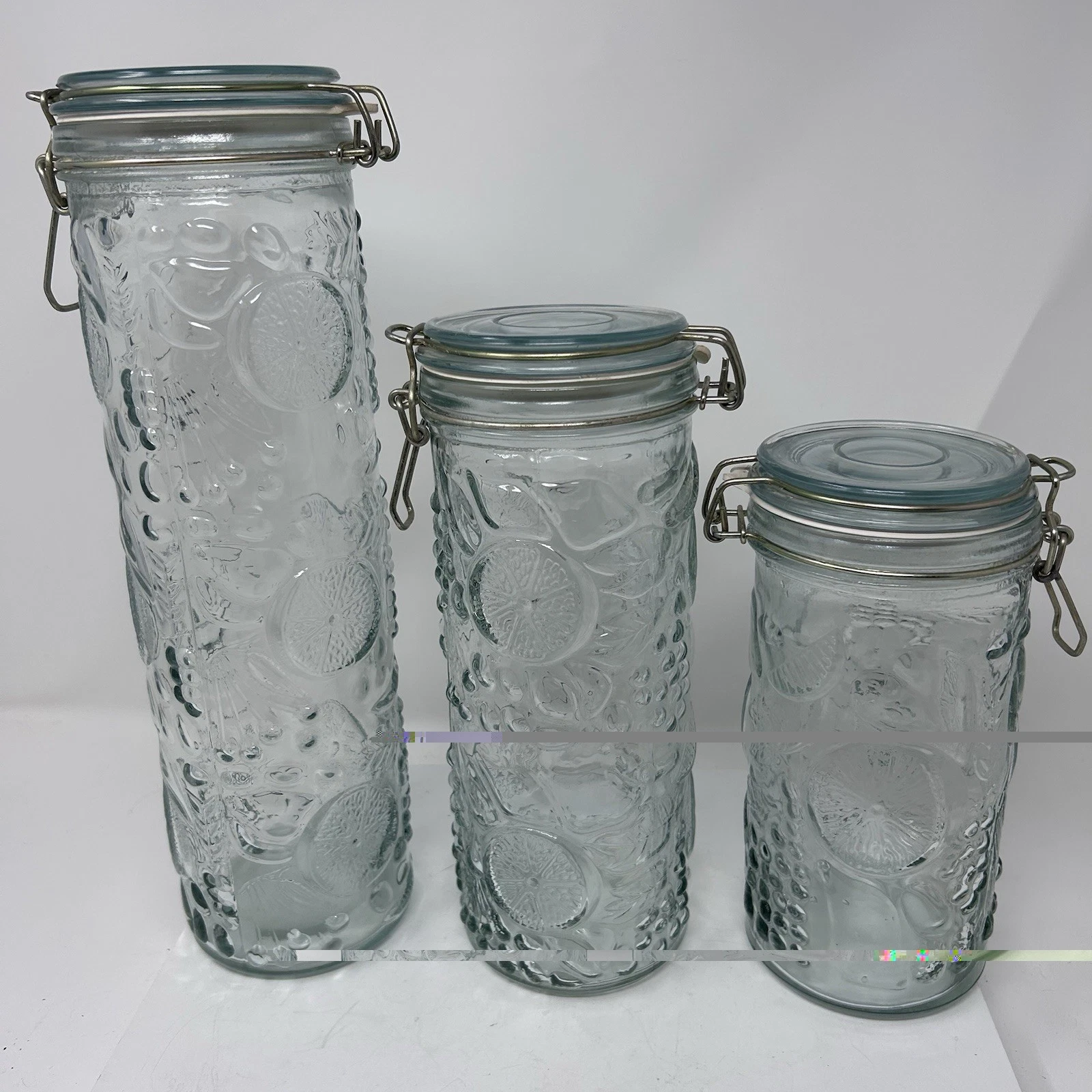 Set of Three Vintage Fruit Embossed/Pressed Clear Glass Canisters Glass Jars
Opens in a new window o
