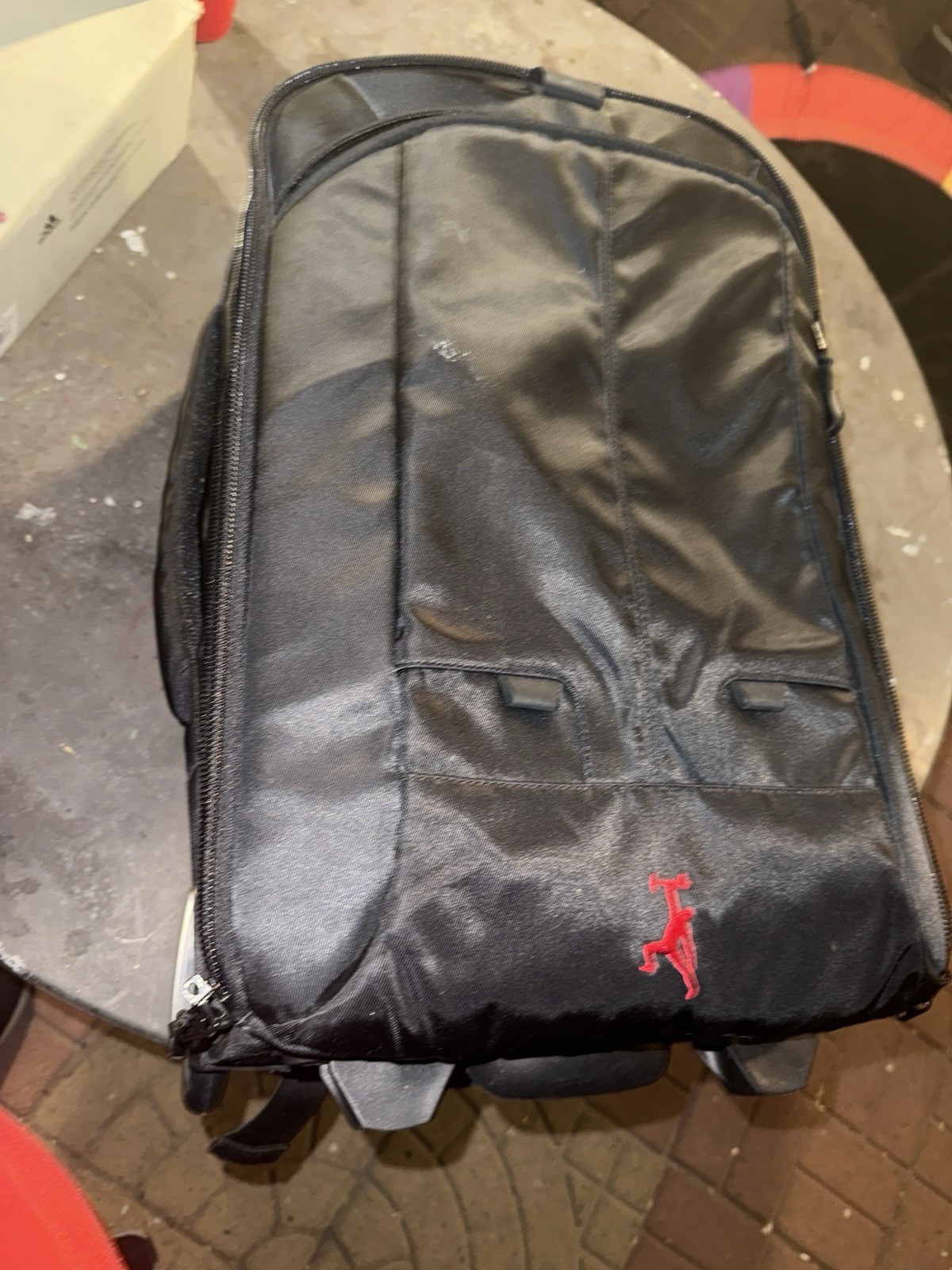 Black Rolling Suitcase with Adjustable Compartmen… - image 1