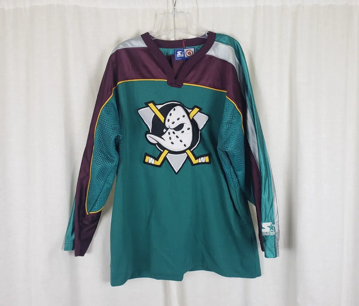 An Anaheim Mighty Ducks jersey is seen in a hockey supply store