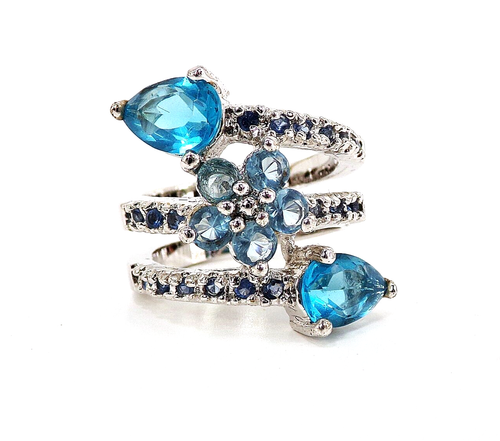 Aqua blue flower cubic zirconia stone ring in a wrapped layered ring ...