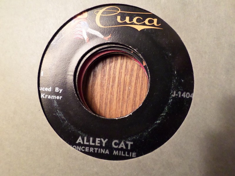 CUCA 45 RECORD J-1404/CONCERTINA MILLIE/ALLEY CAT/WINGS OF A DOVE/ EX
