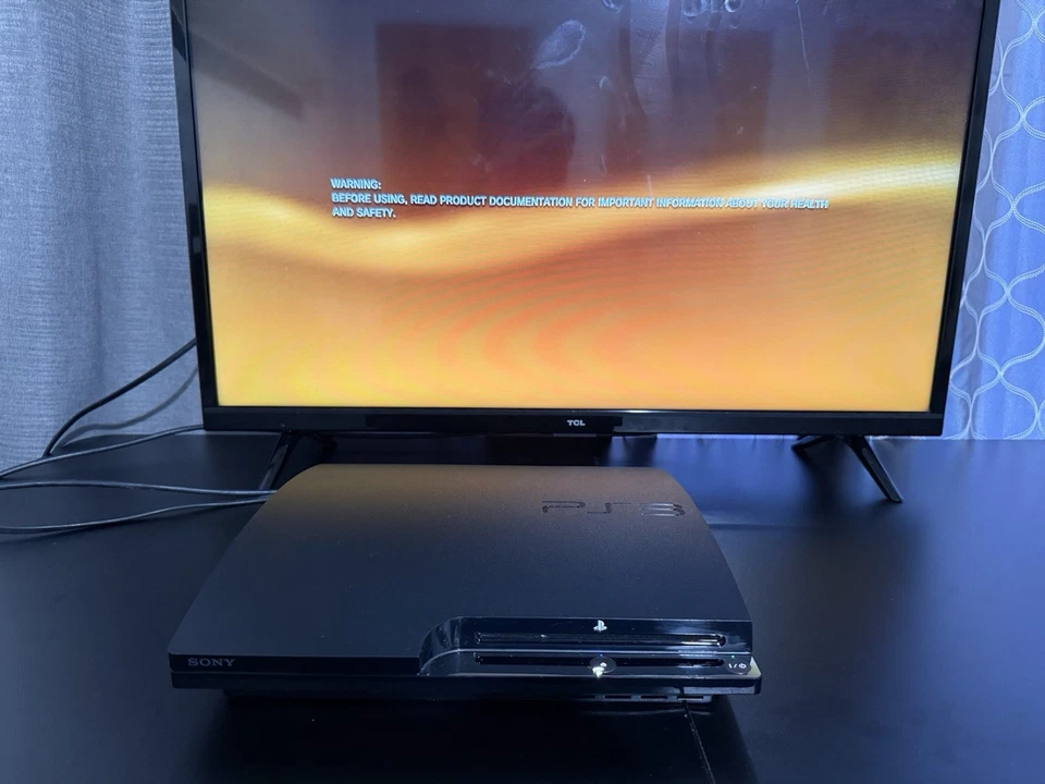 Sony PlayStation 3 Slim Negro Foto 2 de 4