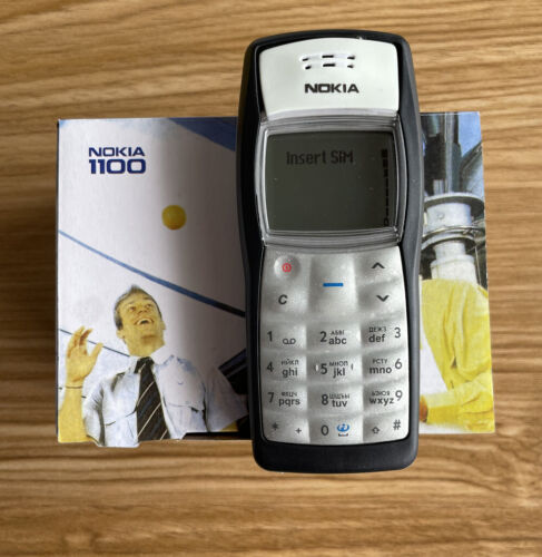 Nokia 1100 Mobile Phone Unlocked GSM900/1800MHz cheap cellphone +1 Year WARRANTY - Afbeelding 1 van 17