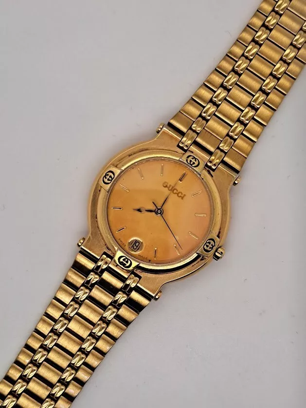 Montre Gucci 9200M plaqué or 7 bijoux fabrication suisse homme/unisexe PIÈCES SEULEMENT