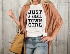 NEW “JUST A SMALL TOWN GIRL” BELLA + CANVAS TSHIRT