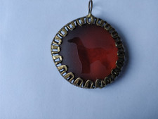 VINTAGE CAMEO PENDANT REDDISH GLASS DOG SILHOUETTE METAL FRAME PATTERNED EDGE