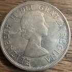 $1 DOLLAR CANADIAN SILVER COIN OF QUEEN ELIZABETH II DEI GRATIA REGINA 1864-1964