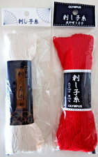 2 - LARGE SKEINS OF RED AND WHITE SASHIKO THREAD