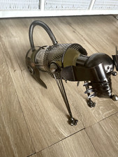 Metal dog wine bottle holder