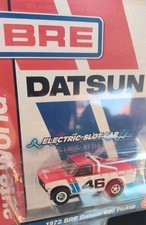New Sealed Auto World Xtraction 1972 BRE Datsun 510 46 HO Scale Slot Car