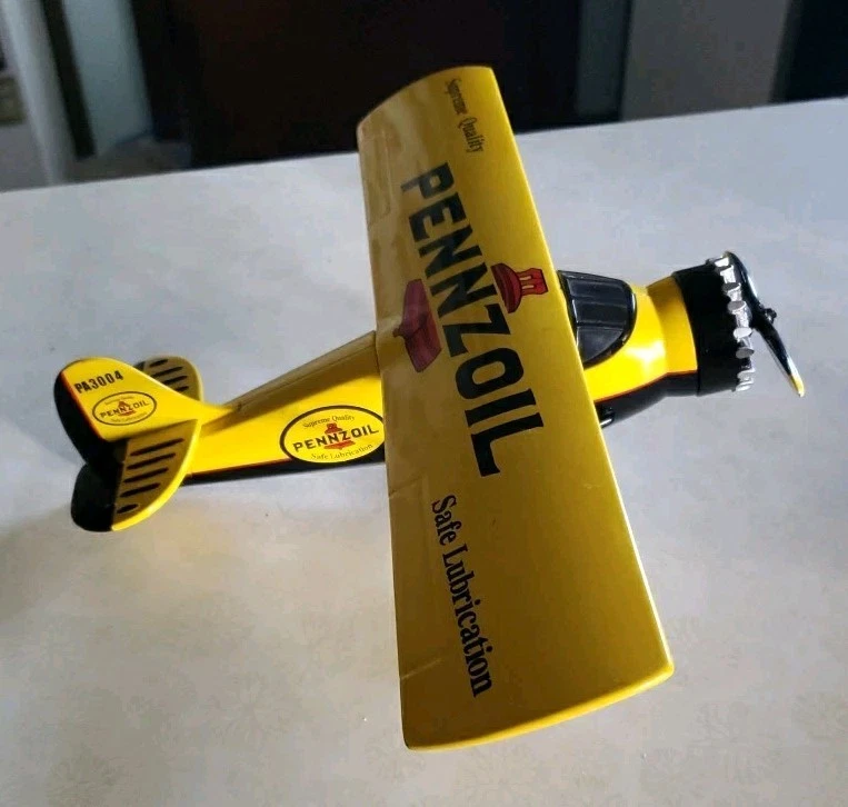 Caja de cambios Juguete Limited Pennzoil Coleccionable Diecast Metal Moneda Banco Avión Amarillo Foto 3 de 4