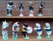 BESWICK - THE PIG PROMENADE - SELECTION OF PIG BAND FIGURES INCLUDES SINCLAIRS.