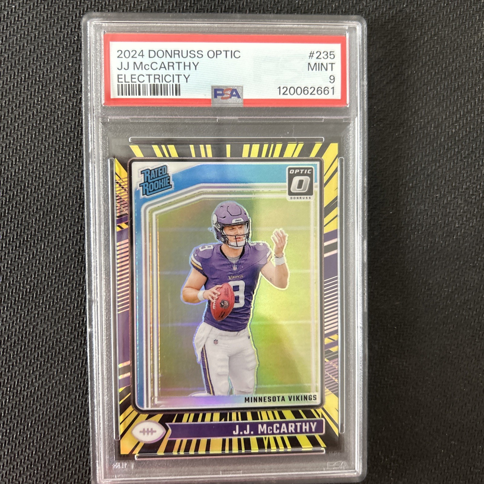 J.J. McCarthy 2024 Panini Donruss Optic #235 Electricity Rated Rookie /75 PSA 9
