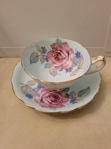 PARAGON Double Warrant Cabbage Rose Teacup & Saucer Light Blue Background
