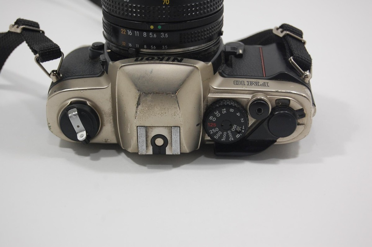Read Nikon FM-10 SLR Camera with 35-70mm 1:5-4.8 Zoom Lens