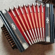 Very old 1 row diatonic button accordion w. 3 couplers at the side 