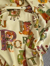 Frieda Clowes Cotton Fabric ‘ ABC’ Yellow Base- Multicoloured Letters X 1 Metre