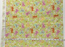 Bunny Dogs Easter Fabric - Bones Eggs Glitter - On Green HALF YARD 100 Cotton