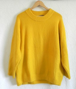 plain yellow sweater