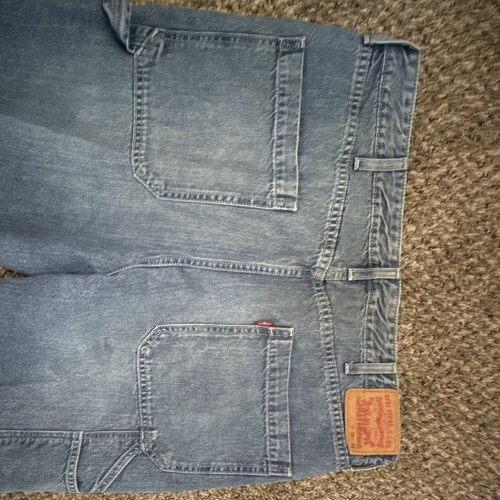 Levi Blue carpenter.38x32