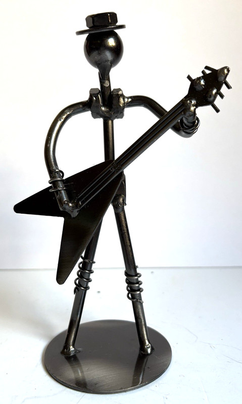 Figurine is Nuts & Bolts Metal Electric Guitar Player, 7" tall