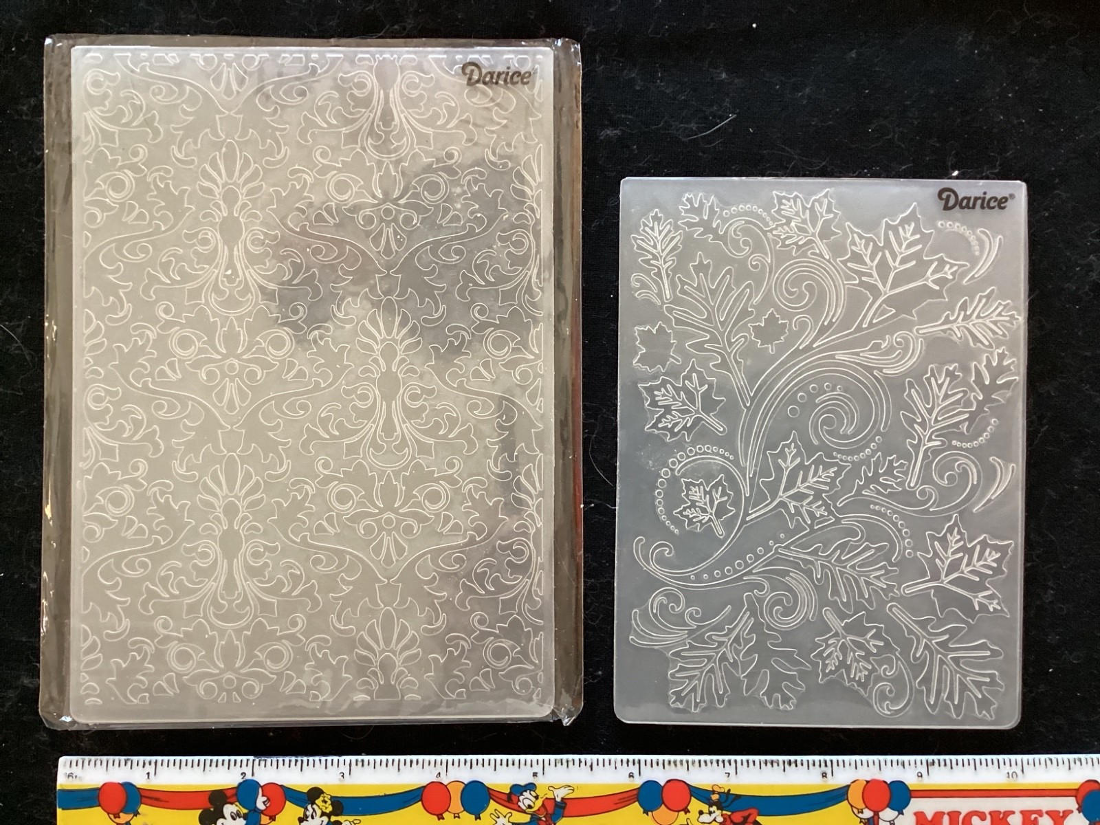 5 darice embossing folders 1 unknown folder. Leaves frame corner scroll used