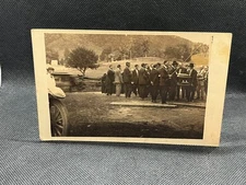 RPPC PALLBEARS AND MOURNERS AT GRAVE SITE IN CEMETERY