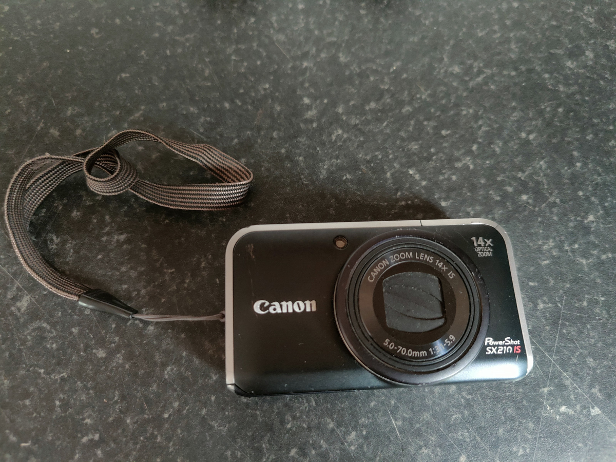 Canon PowerShot SX210 IS 14.1MP Digital Camera + charger