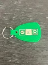 Vintage AC GM Delco General Motors Neon Green Plastic Keychain