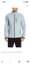 This is an Asics Winter Accelerate Jacket in a light blue or gray color.